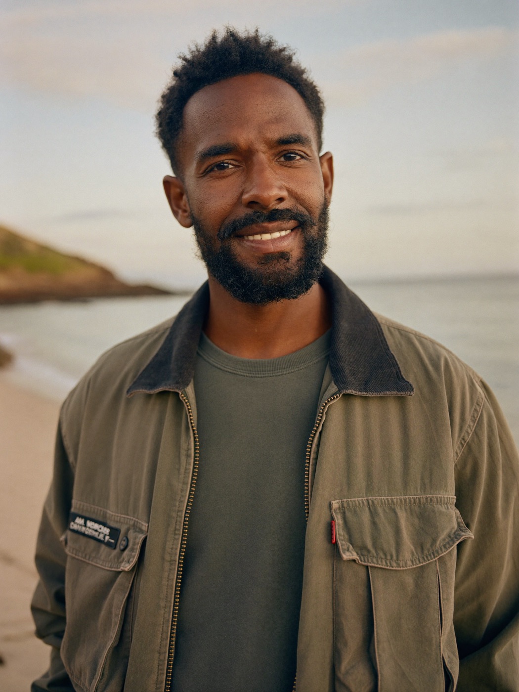 Portrait of Kito Reyes on a beach